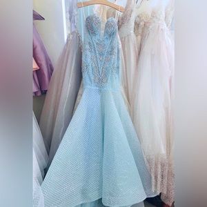 light blue beaded mermaid gown.